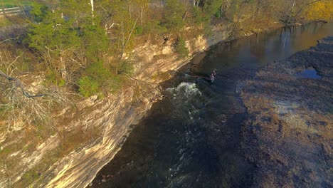 Family-in-canoe-heading-through-rapids-on-Elkhorn-Creek