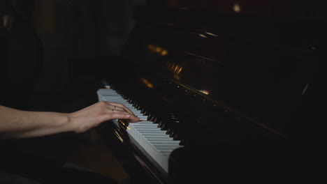 woman playing piano