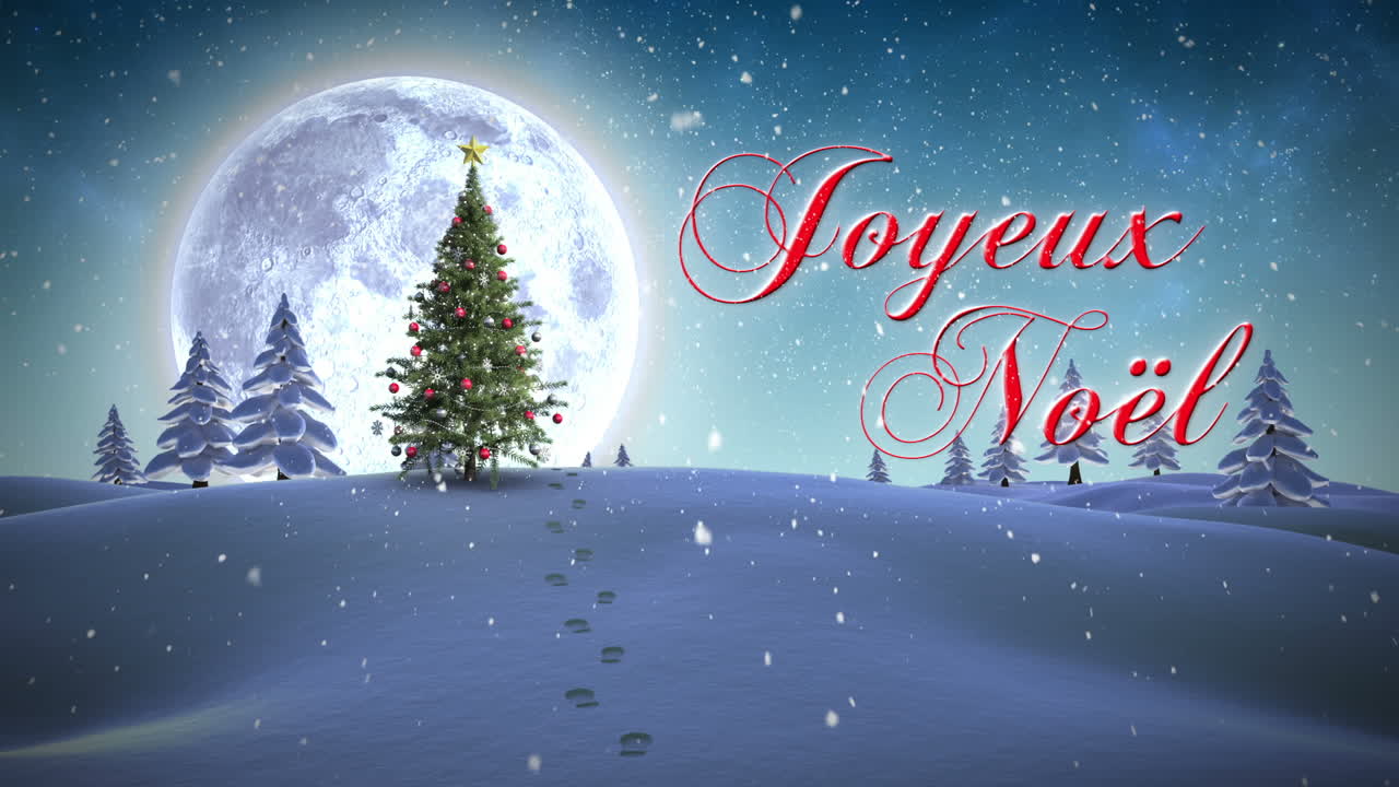 Message "Joyeux Noël" apparaissant dans un paysage enneigé