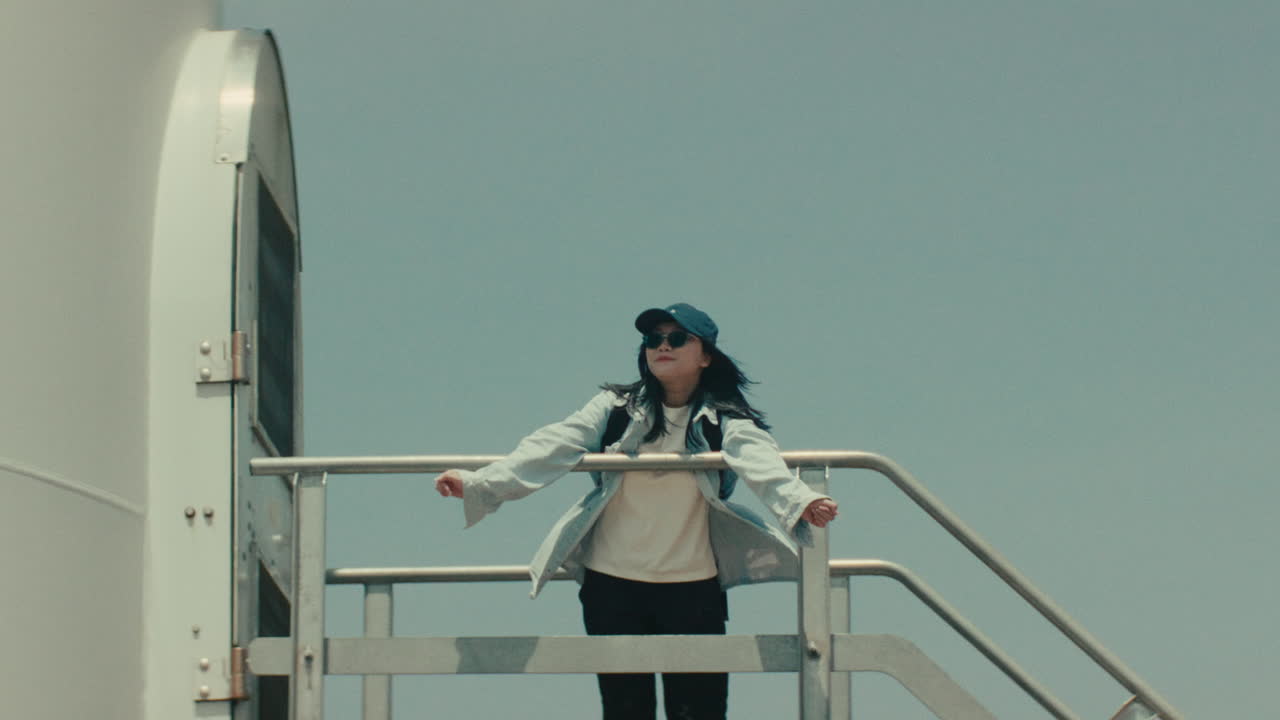 Woman near Wind Turbine