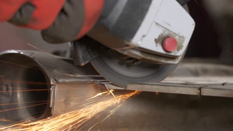 Circular-Saw-Cutting-into-Metal-and-Sparking,-Extreme-Close-Up