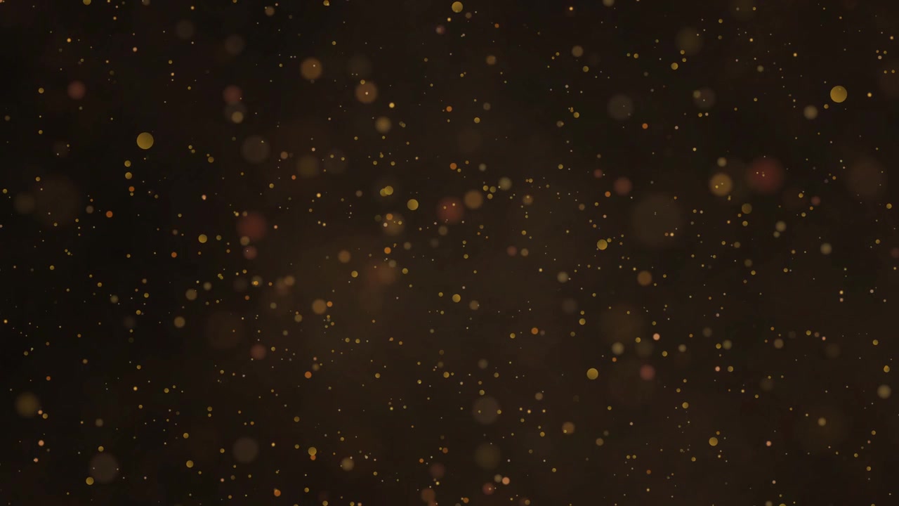 Loopable dark golden bokeh particles drifting and floating, defocused ...