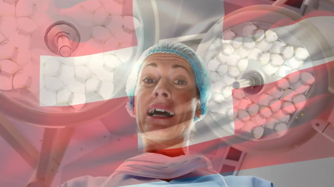 수술실에서 마취과 의사 위에 흔드는 스위스  ⁇ 발의 애니메이션