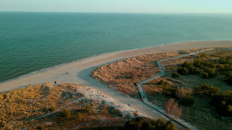 Coastal-Boardwalk-On-Sandy-Seashore-In-Hel-Peninsula,-Puck-Bay,-Poland