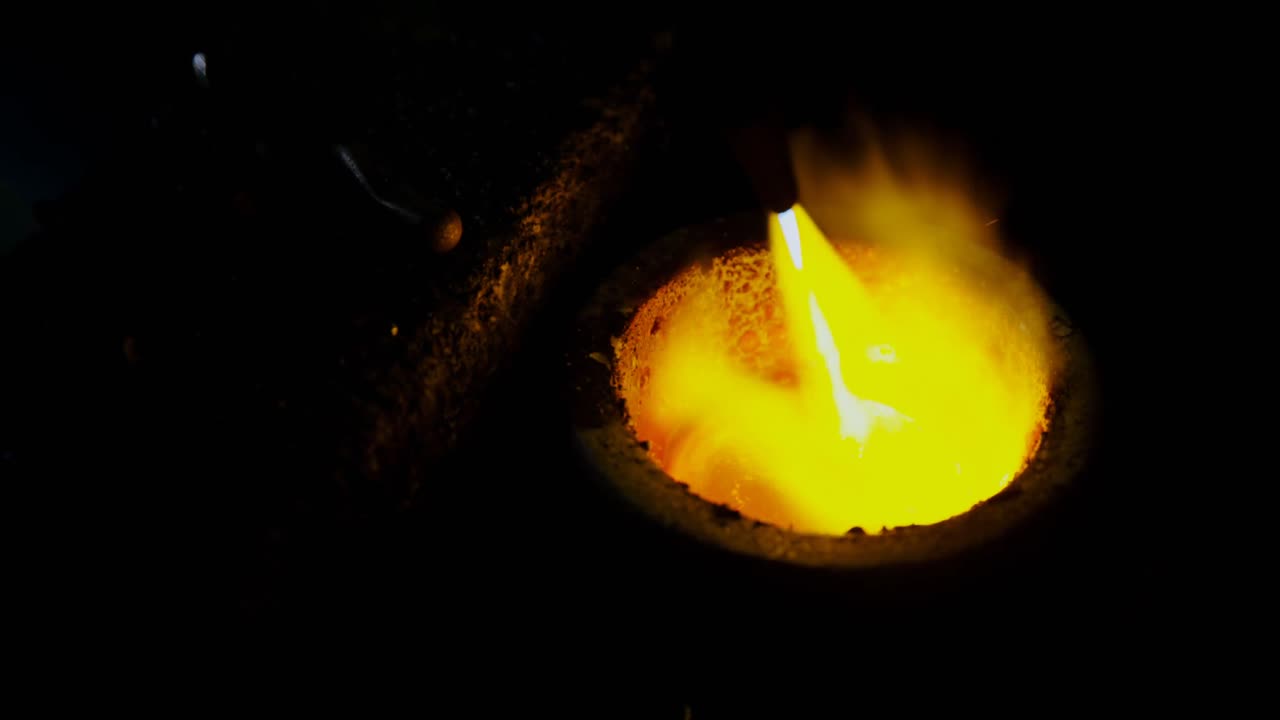 Acetylene torch melting the hot metal 4k