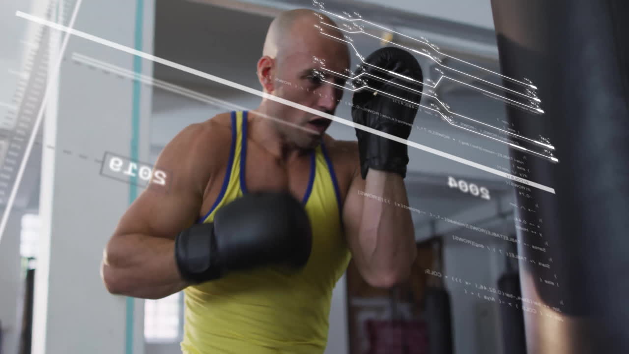 Bald man in yellow tank top boxing with digital data overlay animation