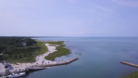 aerial view of a beautiful beach with boats and people
