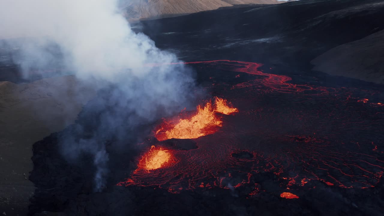 Active 2022 fissure volcano in Iceland, Fagradalsfjall eruption in valley, aerial