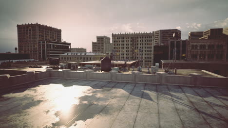 urban skyline at sunset with buildings and rooftops illuminated