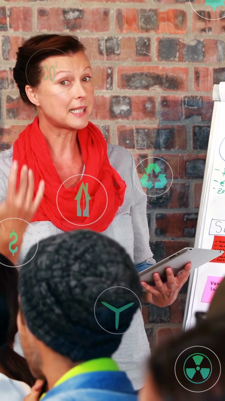 Host raising hand, pointing to flipchart, checking tablet, inviting response, green icons appearing