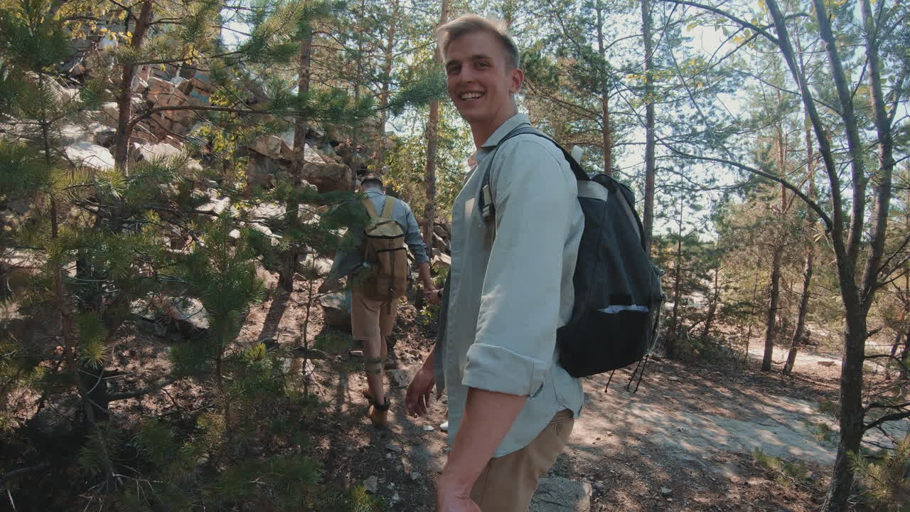 POV of Woman Hiking with Boyfriend and Friends