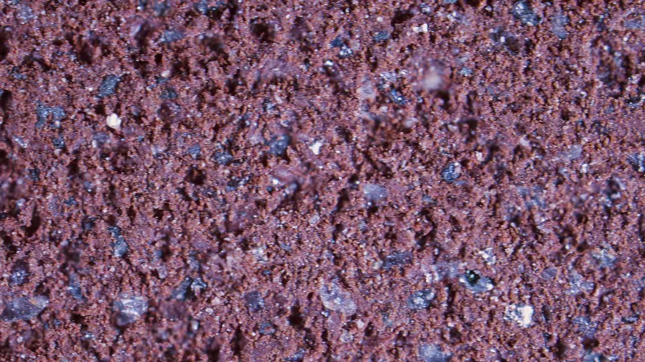Abrasive disc texture under microscope wit silicone carbide particles