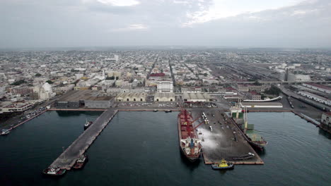 drone shot of boats parked in the port of veracruz at sunrise