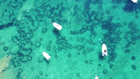 Aerial-Drone-View-of-Boats-and-Clear-Blue-Adriatic-Sea-at-Krk-Island,-Croatia