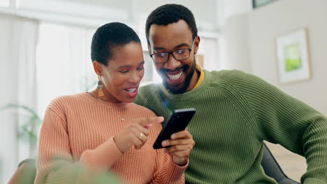 Home,-relax-and-black-couple-with-a-cellphone