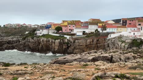 slow motion of the waves shocking with the cliff at portugal coast