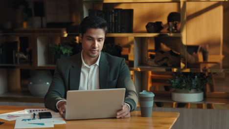 businessman working on laptop in modern office