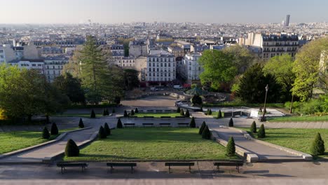 wide angle unique view of square louise michel in montmartre paris empty and restful during summer day.