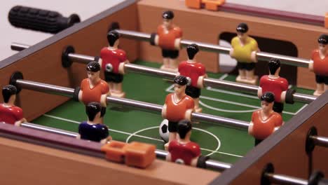 playing football soccer on game table