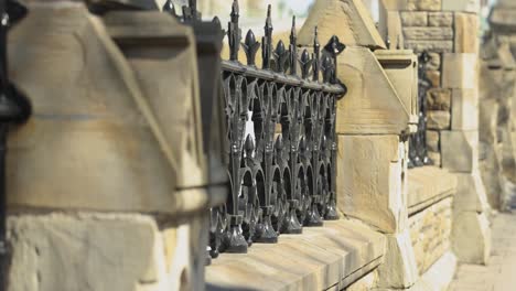 beautiful stone and iron gates that surround the parliament hill in ottawa, canada