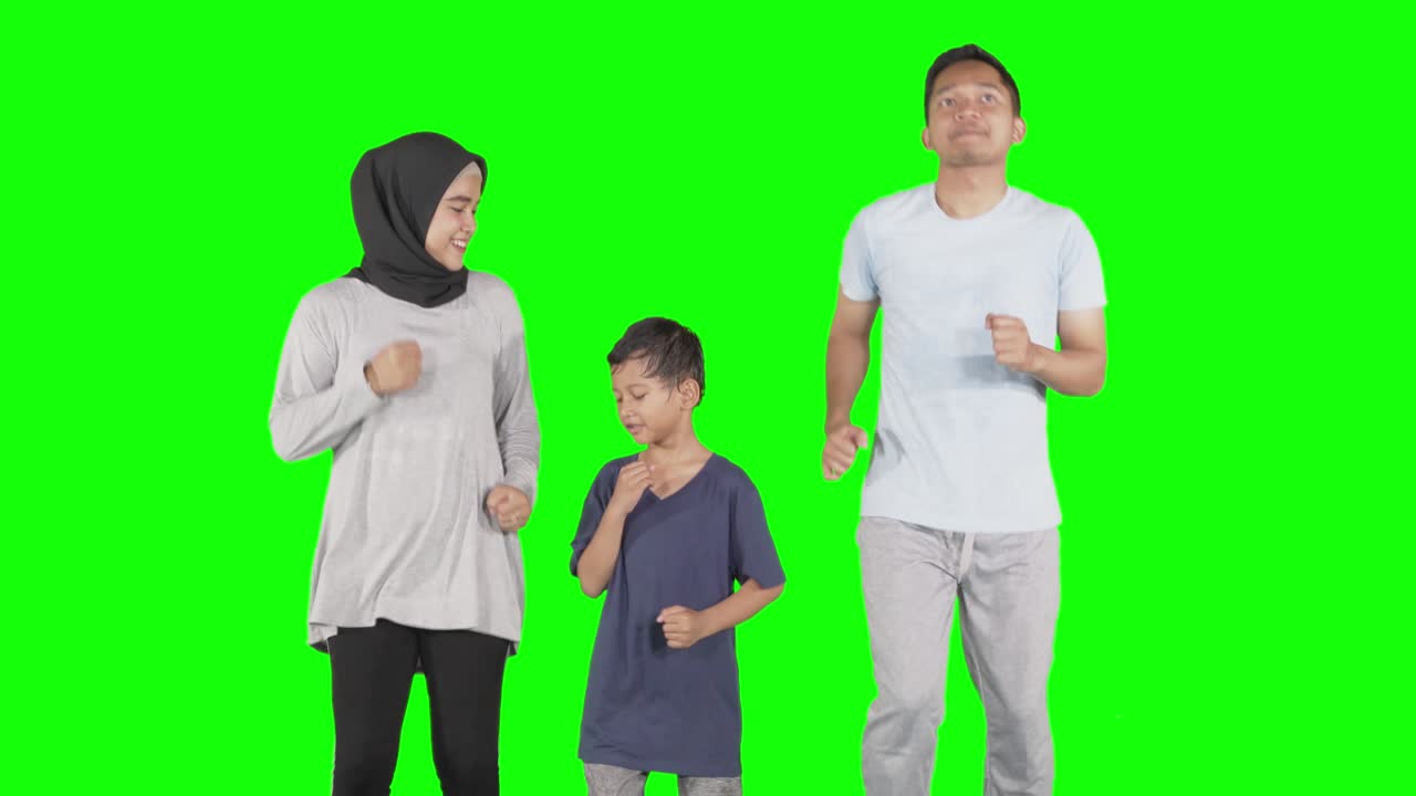 Happy family doing workout by running in place