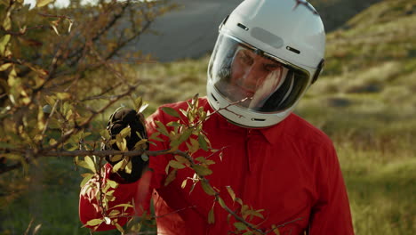 astronaut analyzes flora vegetation plant foliage in new planet to explore