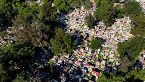 aerial orbit of the tombstones of the general cemetery of iztapalapa on a sunny day in cdmx, mexico