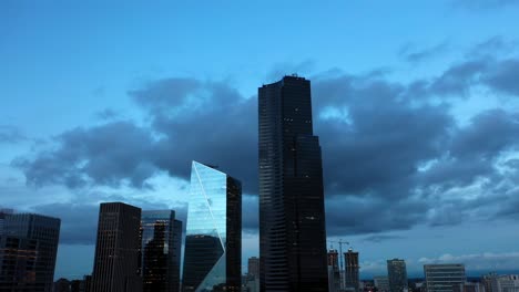 lowering aerial of seattle's daunting columbia tower on an overcast and gloomy morning