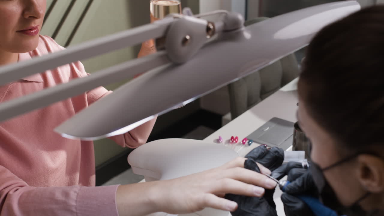 Celebrating a manicure or pedicure session with Champagne