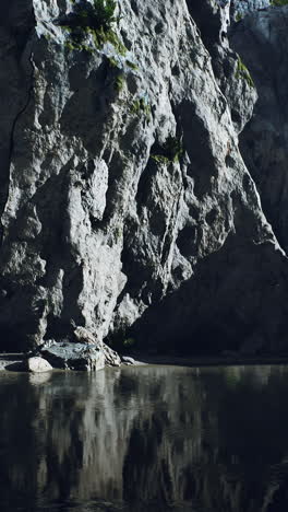 a river flows through a rocky canyon