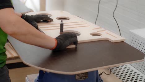 woodworking process: sanding wood parts