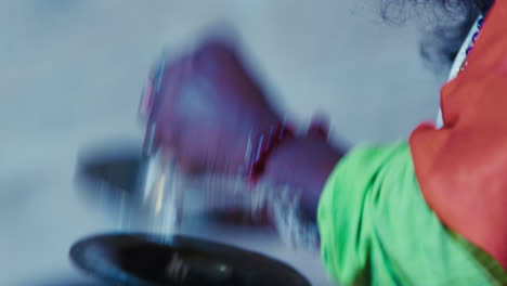 musicians play cymbals during the indian festival of diwali near the river