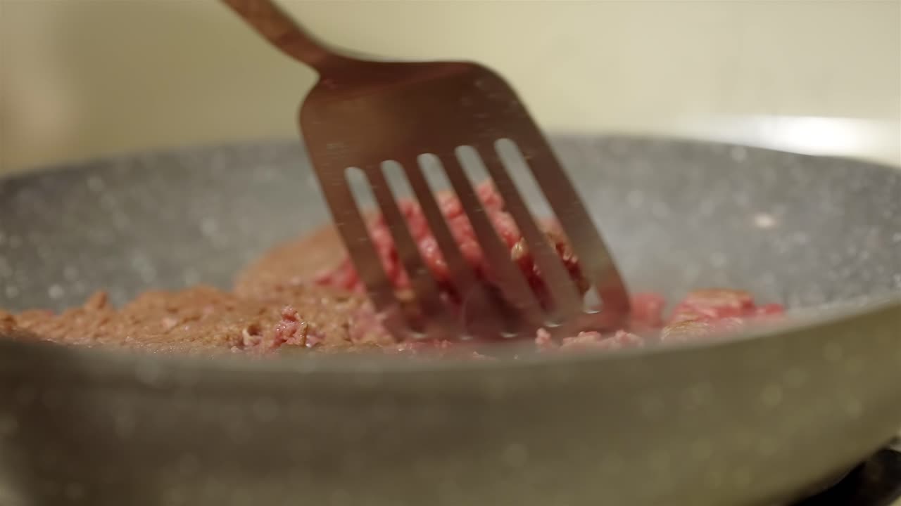 Cooking Ground Beef for Tacos in Pan Close-Up 4K