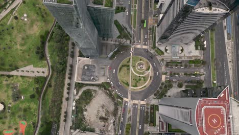 Drone-birds-eye-view-of-Santa-Fe-Avenue-and-its-skyscrapers,-Mexico-City