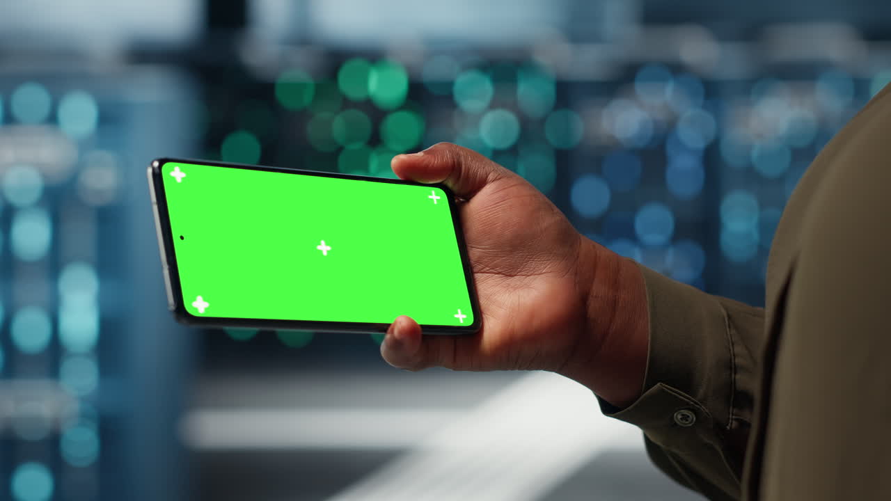 Server hub admin uses isolated screen smartphone to watch video tutorial