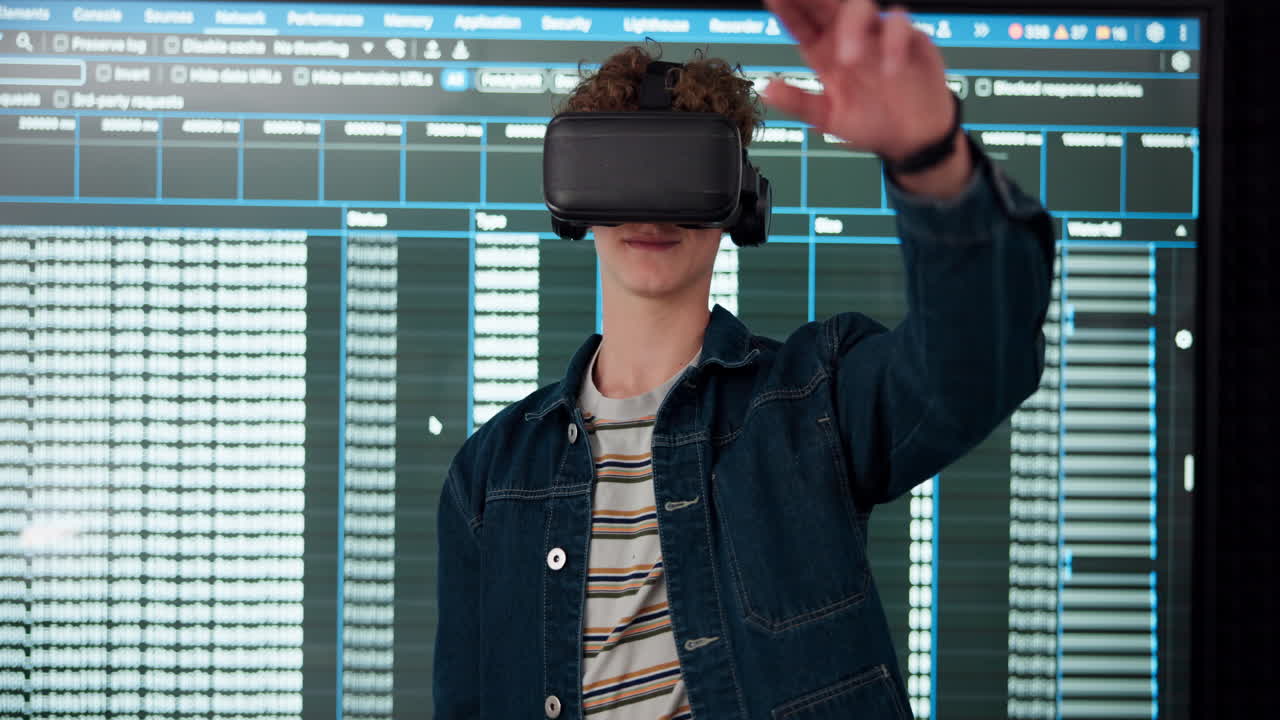 Teenager using VR headset with coding background