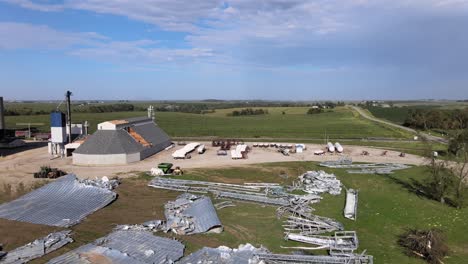 aerial drone video wind damage to rural, agrarian agricultural crops and farmland in the midwest heartland of iowa