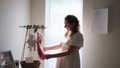 a joyful mother lovingly prepares for her beloved childs arrival surrounded by love excitement and a joyful mother lovingly prepares for her beloved childs arrival surrounded by love excitement and warmth