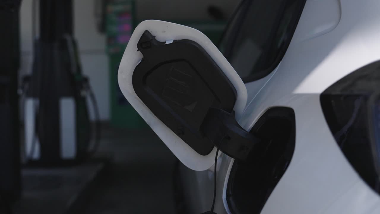 Refueling a car at a gas station