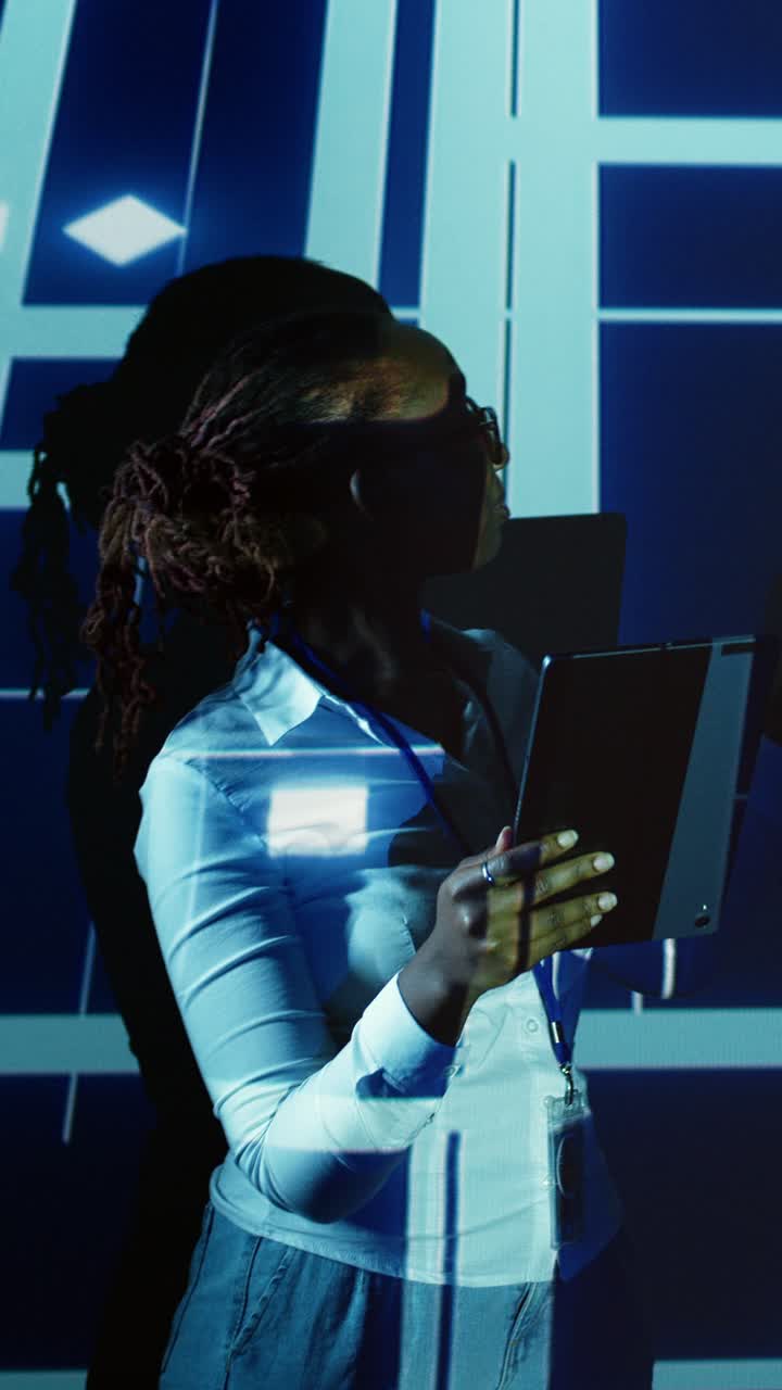 Vertical video Computer scientist in AI server farm