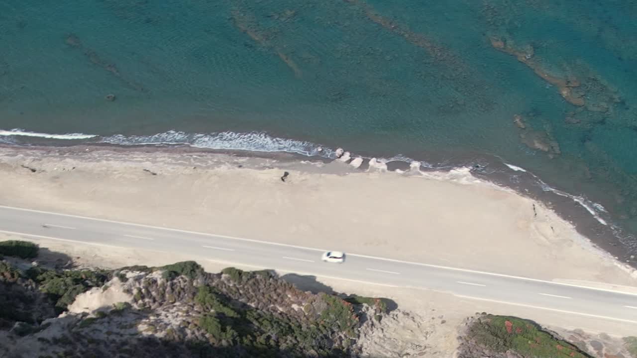 Explore the lush greenery along the coastal cliffs of Greece