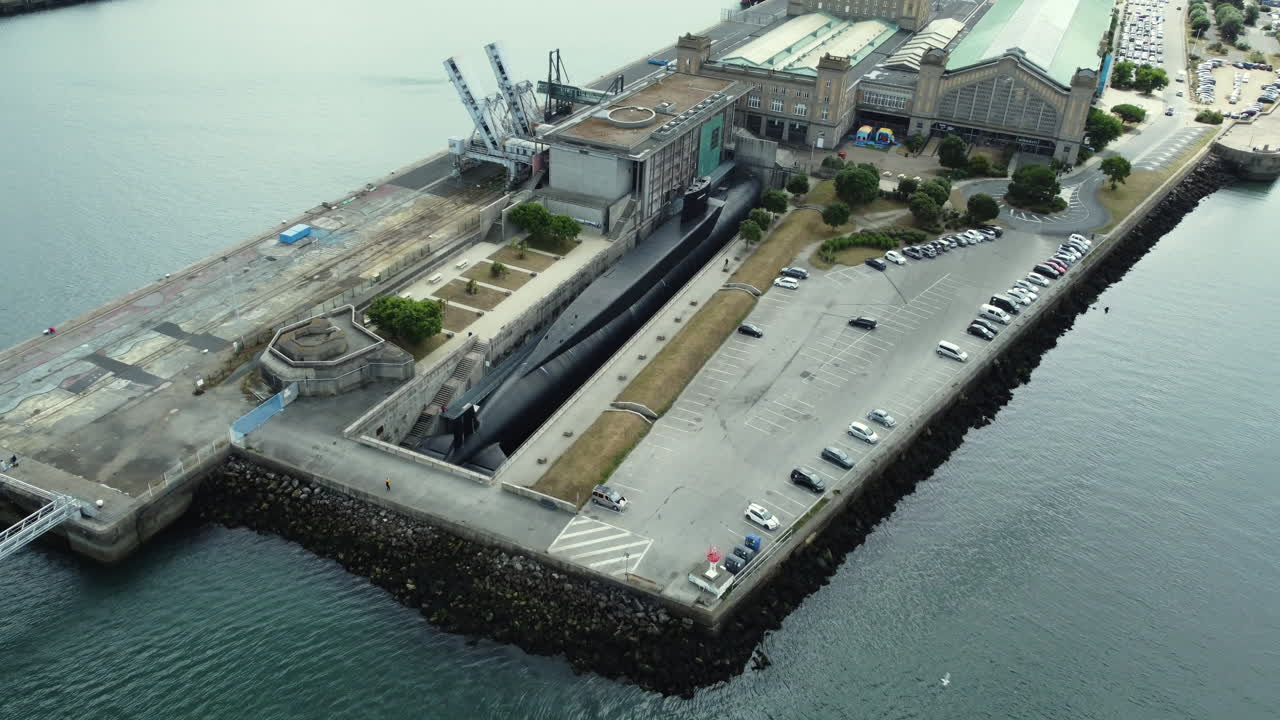 Submarine in a Port with Surrounding Facilities
