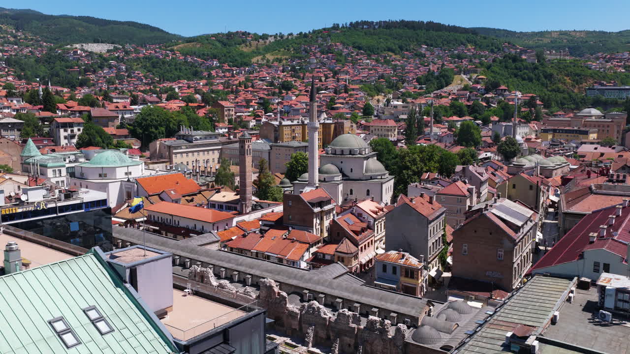 Historical Place Of Clock Tower Near Gazi Husrev-beg Mosque In Sarajevo, Bosnia and Herzegovina. Aerial Drone Shot