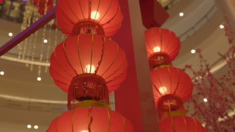 red chinese lanterns inside klcc malaysia new year rabbit 2023 tilt shot