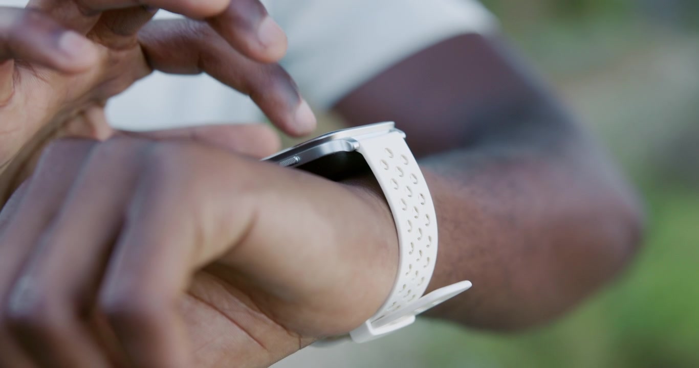 Close-up of a Person Using a Smartwatch