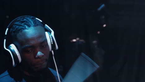 man wearing headphones in a studio