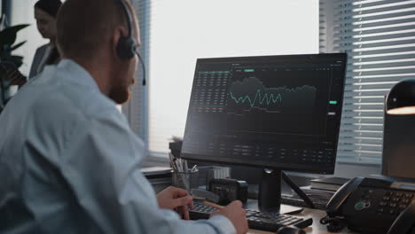 businessperson analyzing stock market data