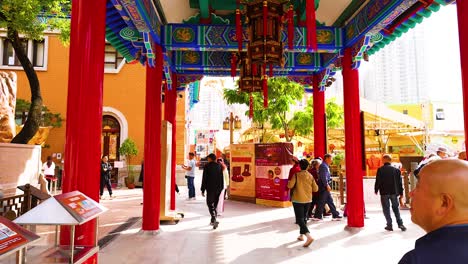 people exploring vibrant temple architecture in hong kong