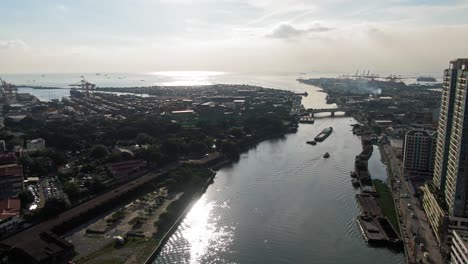 picturesque view of the boat crossing the river connected to the sea