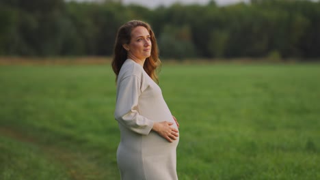 pregnant woman in a field